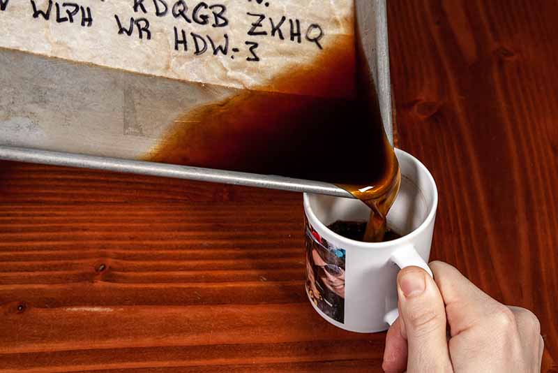 Pour excess coffee off paper