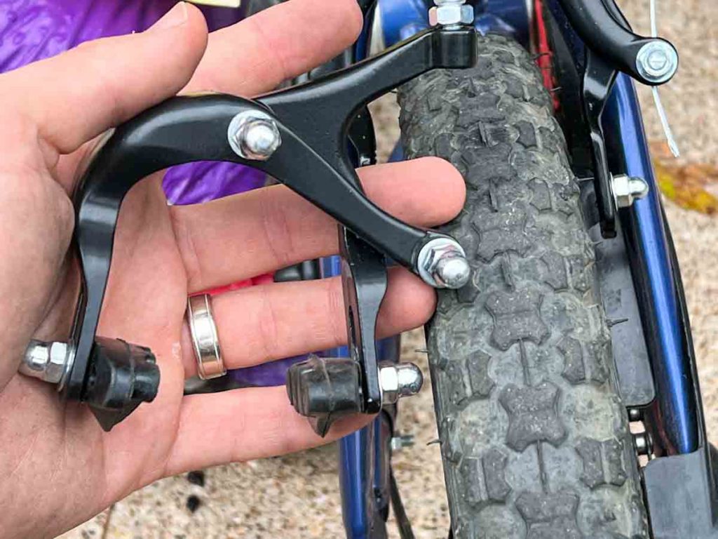 Too small brake next to a child's bike tire