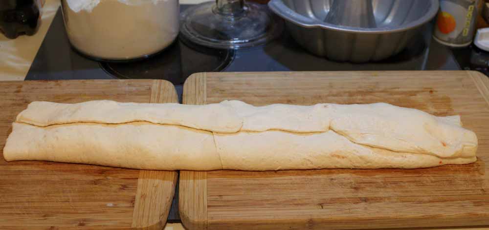 Pizza dough rolled up